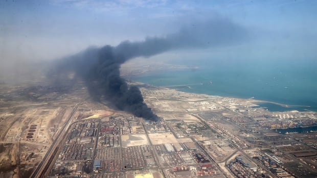 Iran president visits injured, calls for probe into port explosion that killed dozens